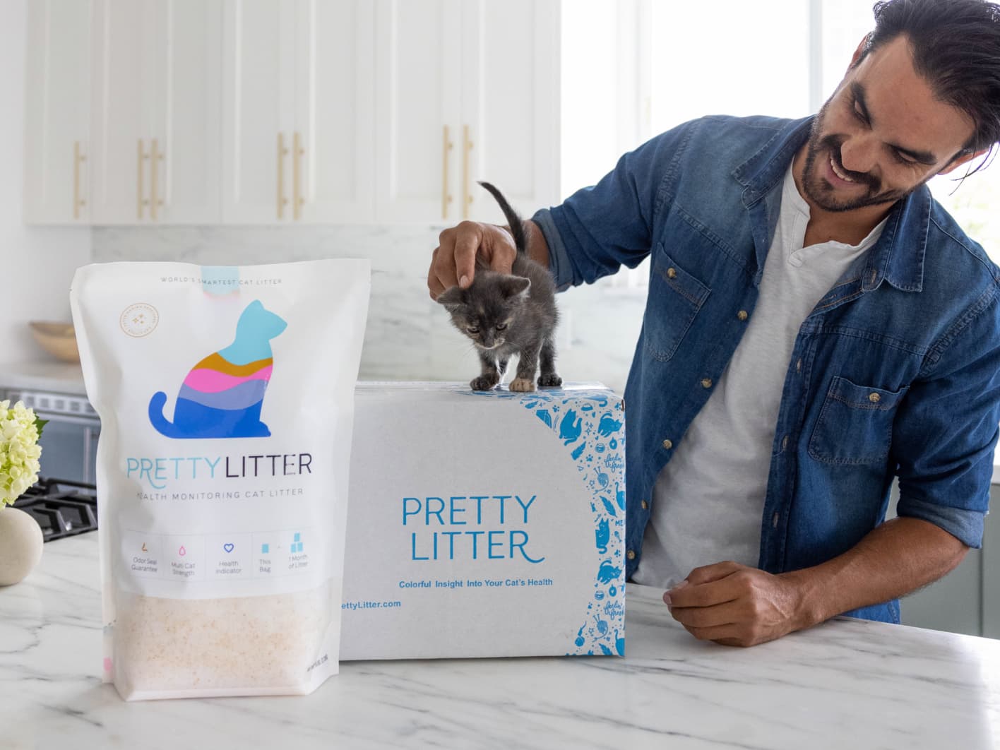 Cat with litter box and PrettyLitter bag