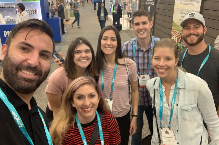 PrettyLitter employees at a trade show