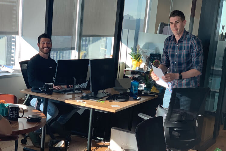 PrettyLitter team members collaborating in office