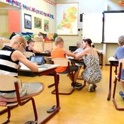 https://res.cloudinary.com/pricejugaad/image/upload/v1594820826/mymoneysouq_images/creditcardsdeals/children-sitting-on-brown-chairs-inside-the-classroom-4019754_1.jpg