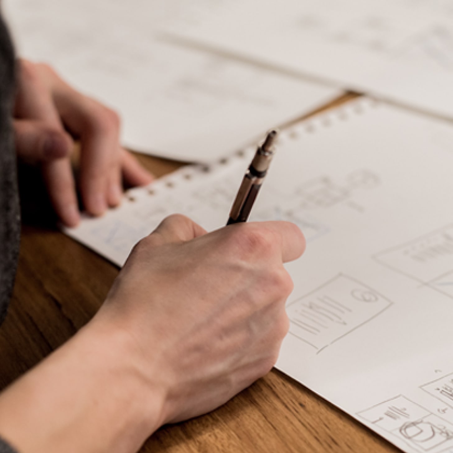 Designer sketching prototypes