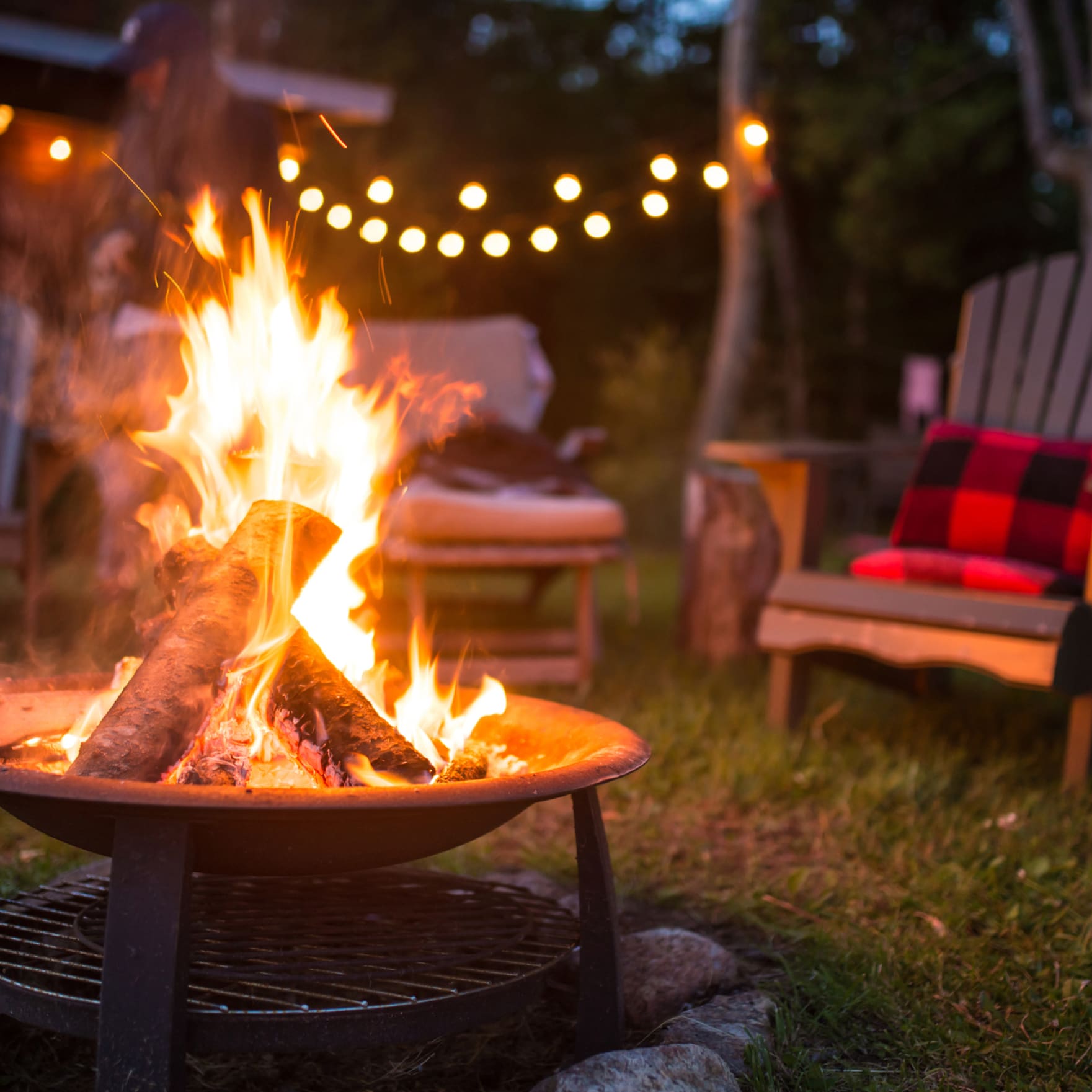 Fire pit with chairs around it