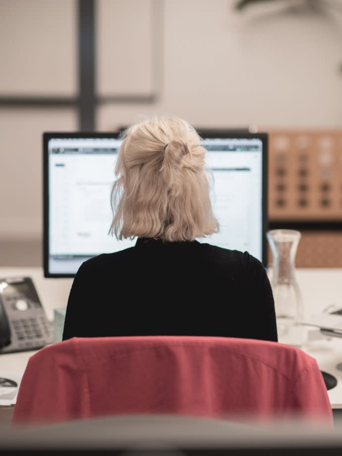 Young woman working on a computer.