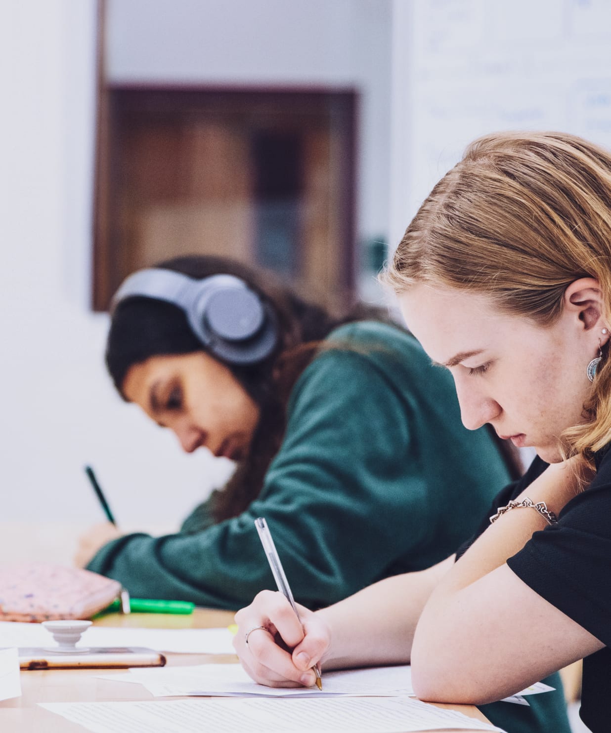 Two students studying with focus