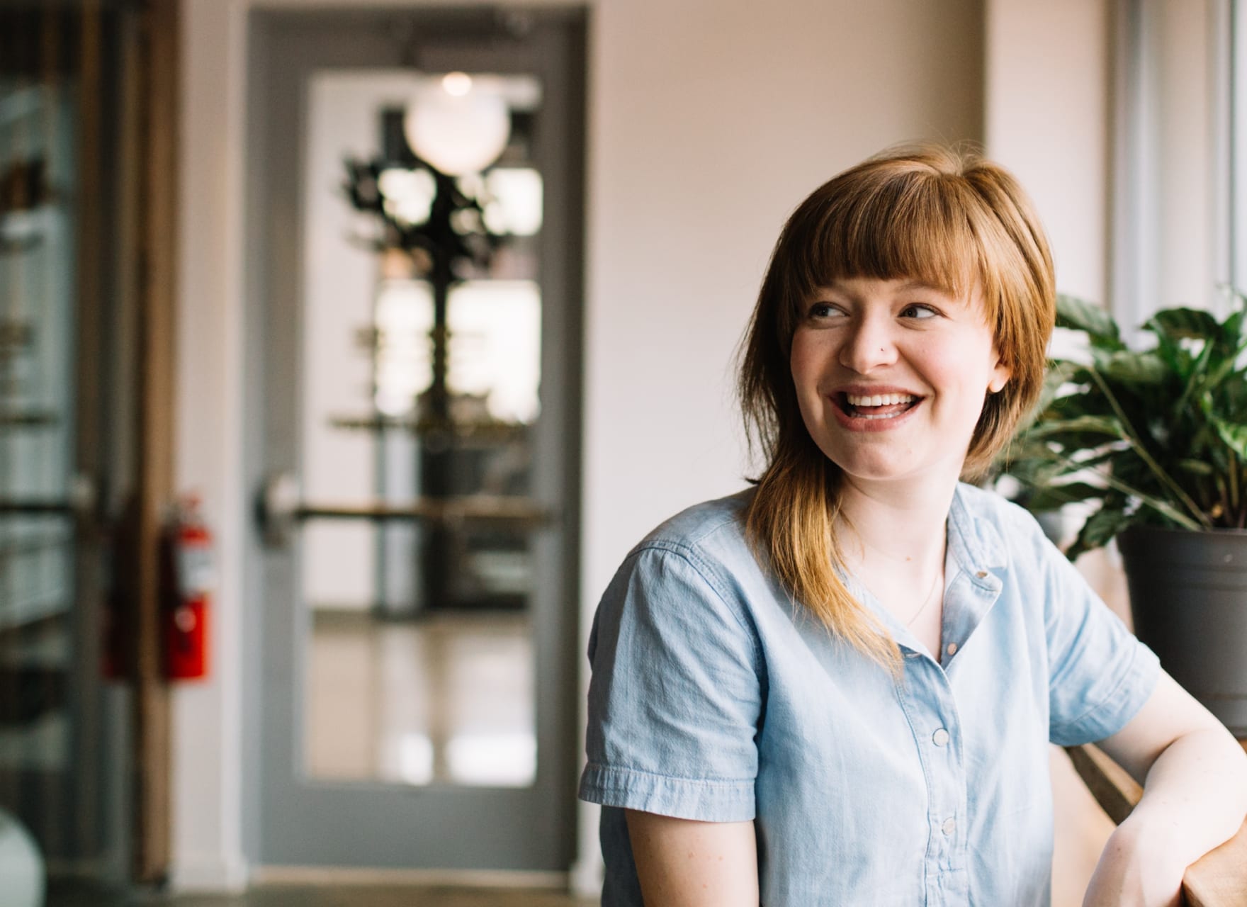 Young woman smiling in an office
