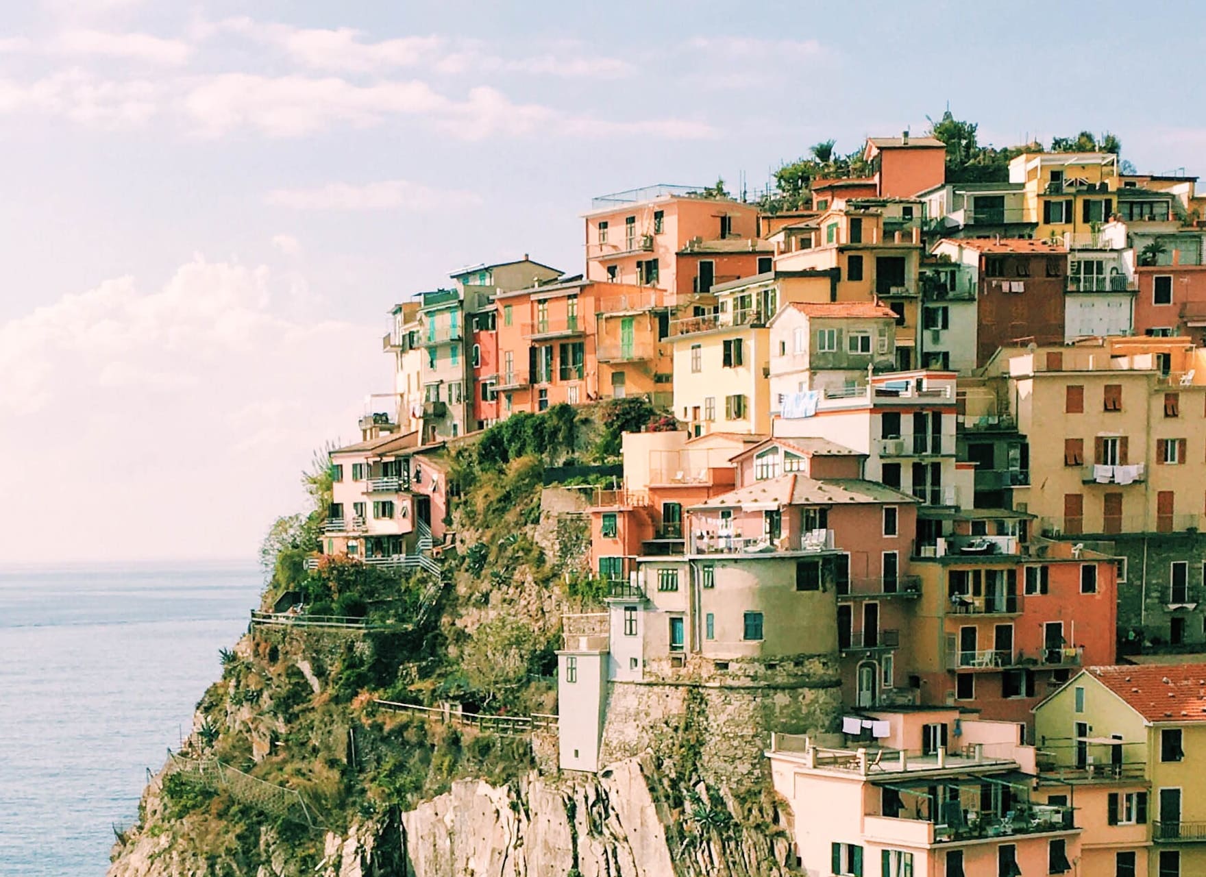 A town on a hill overlooking the ocean