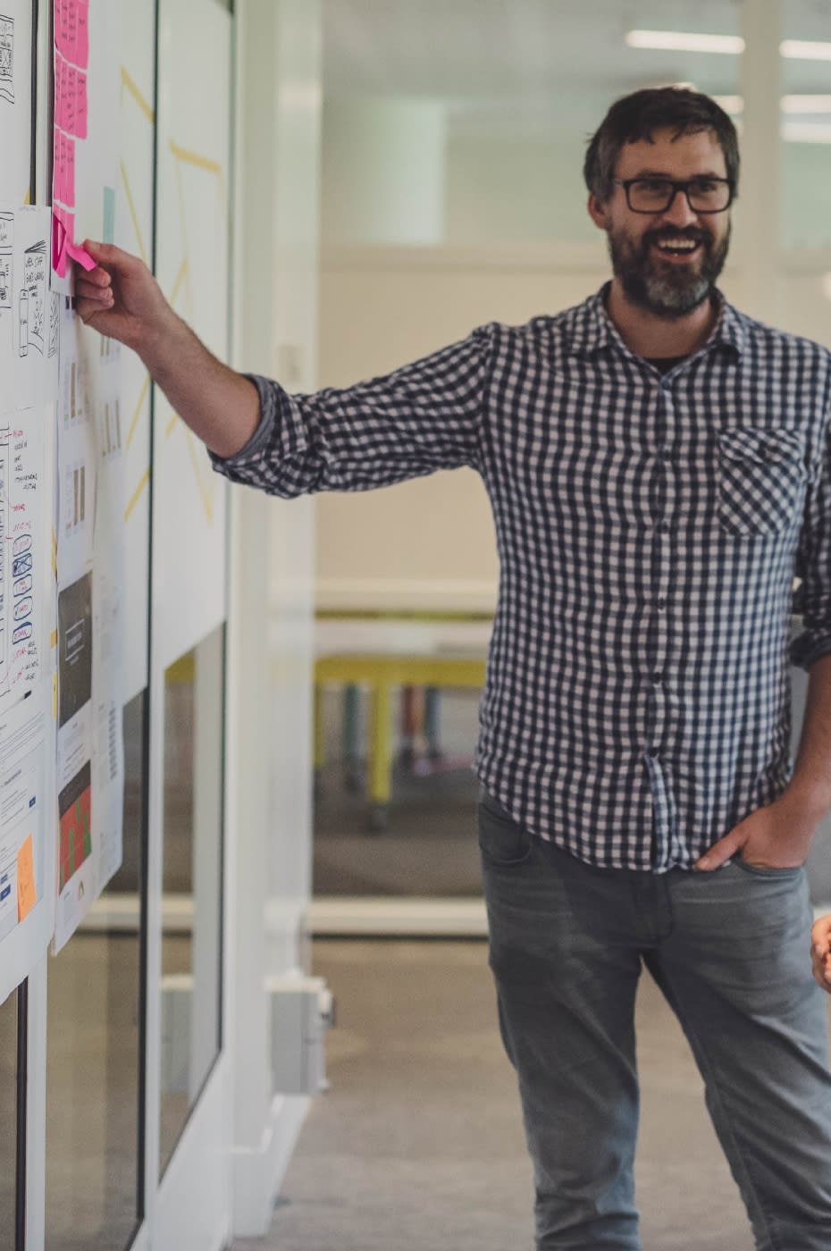 Designer pointing to design