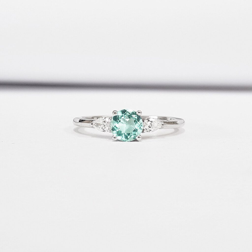 Mint sapphire and pear diamond ring