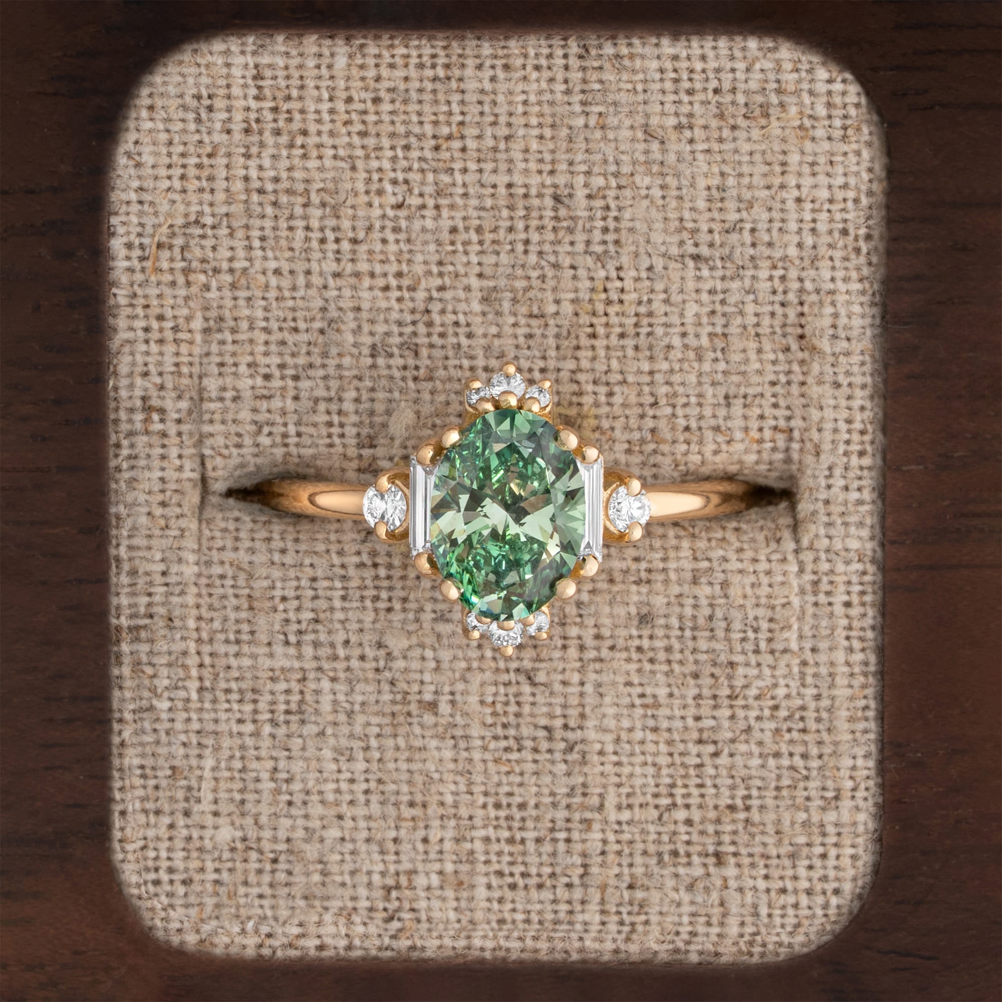Oval green diamond cluster ring 
