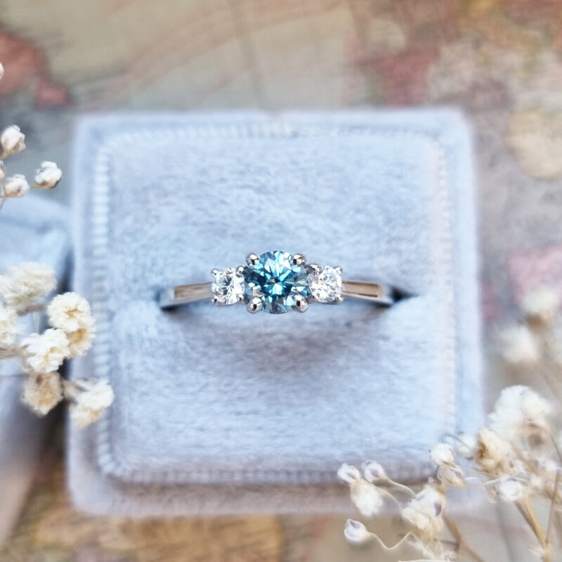 Lab grown aqua blue diamond trilogy ring in platinum — 1