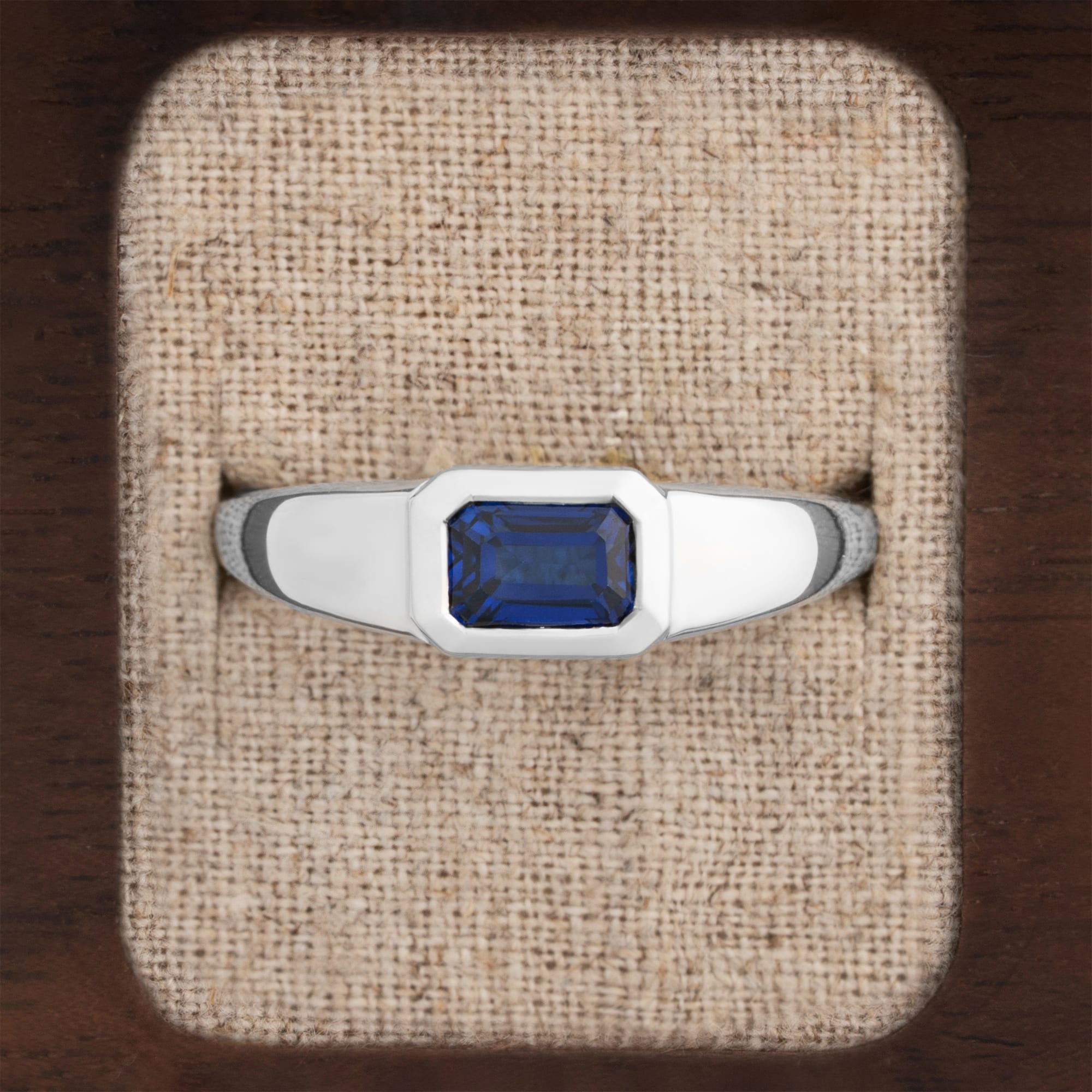 Emerald Cut lab sapphire tapered band — 1