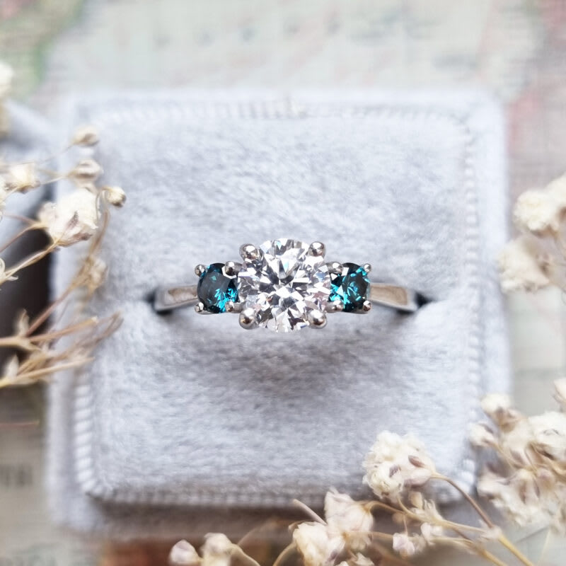 Lab grown teal diamond trilogy ring in platinum — 1