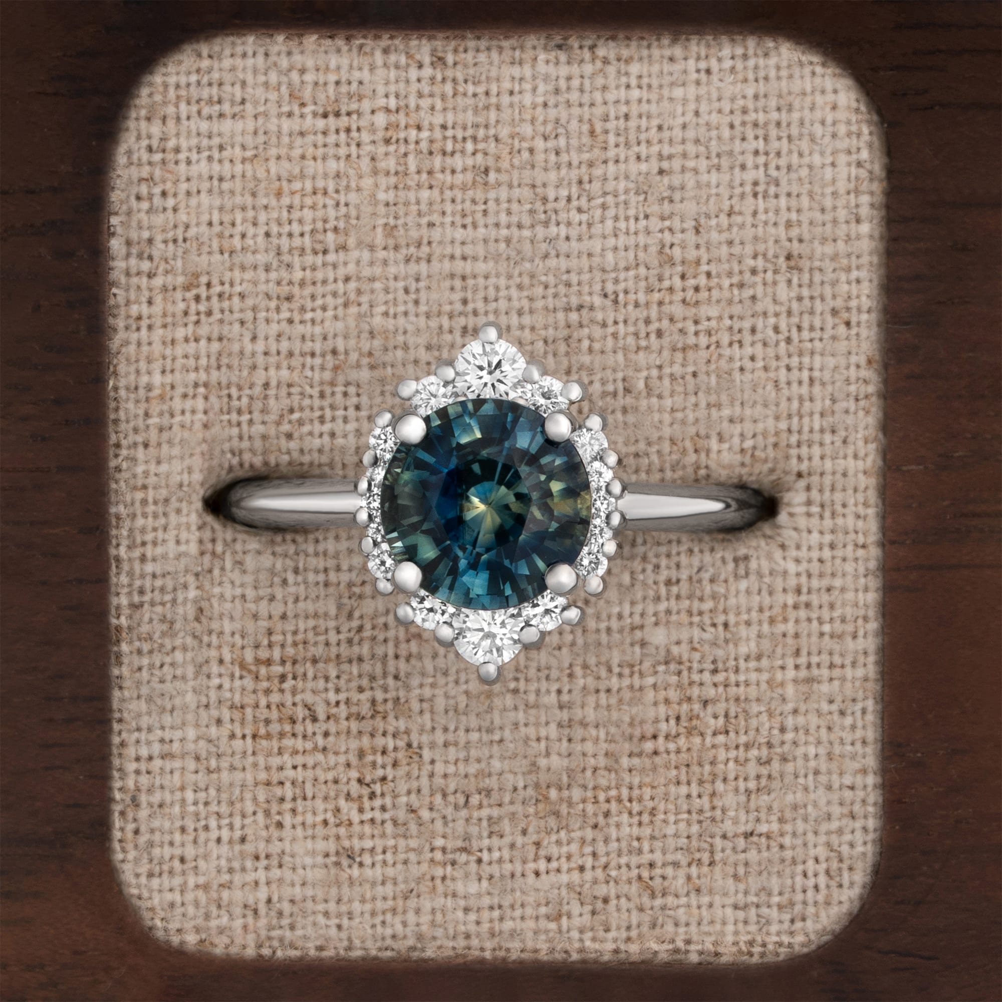 Parti sapphire and diamond halo engagement ring