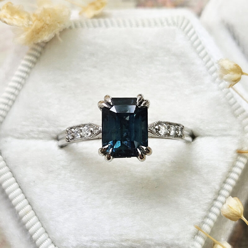 Emerald cut deep teal sapphire and diamond ring — 1