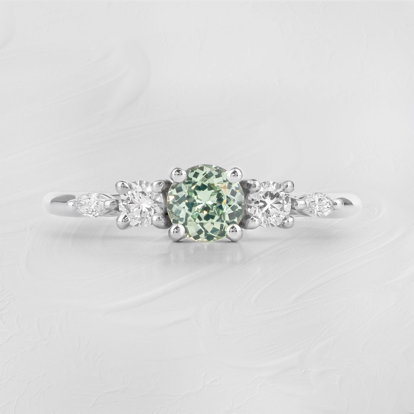 Precision cut seafoam green sapphire and diamond trellis ring  — 1