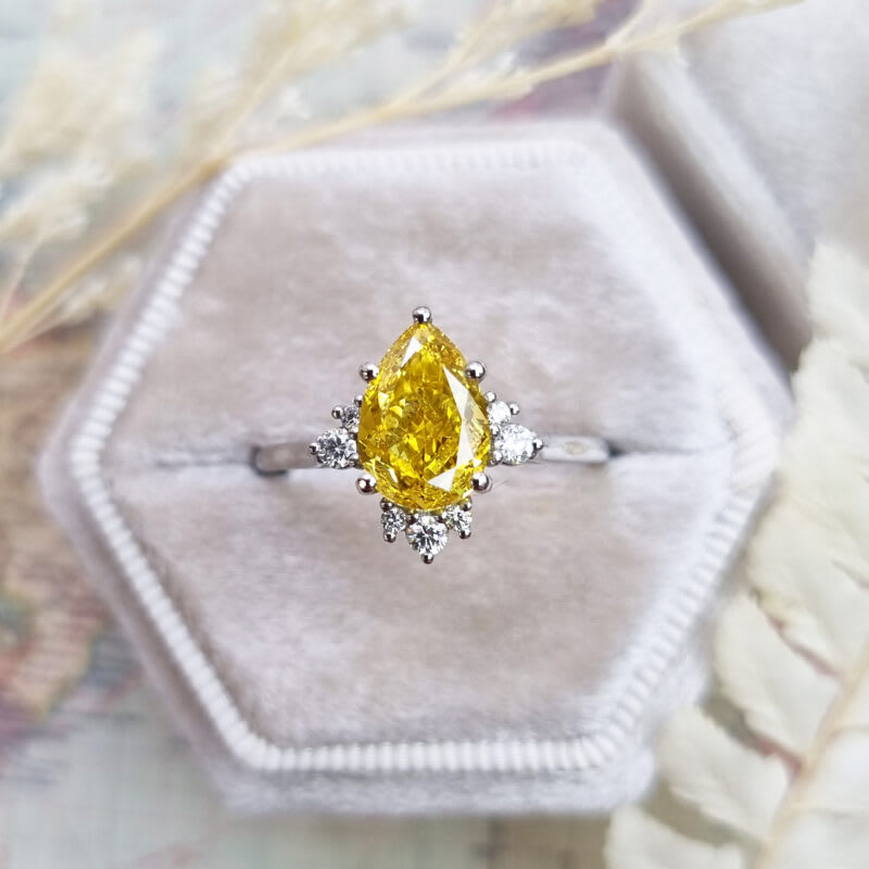 Pear cut lab grown yellow diamond ring