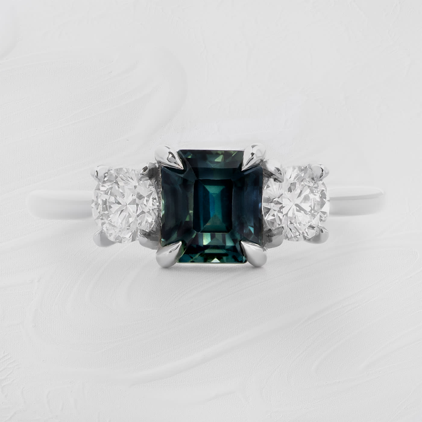 Emerald cut teal sapphire and diamond ring — 1