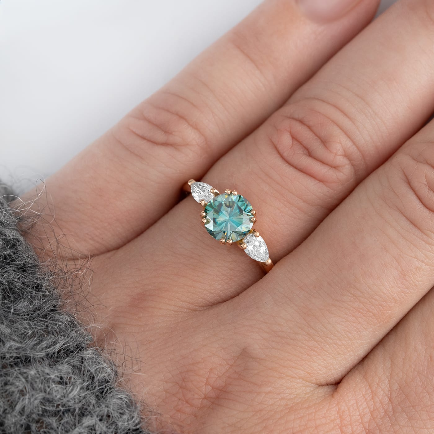 Blue moissanite and pear diamond trilogy ring — 1