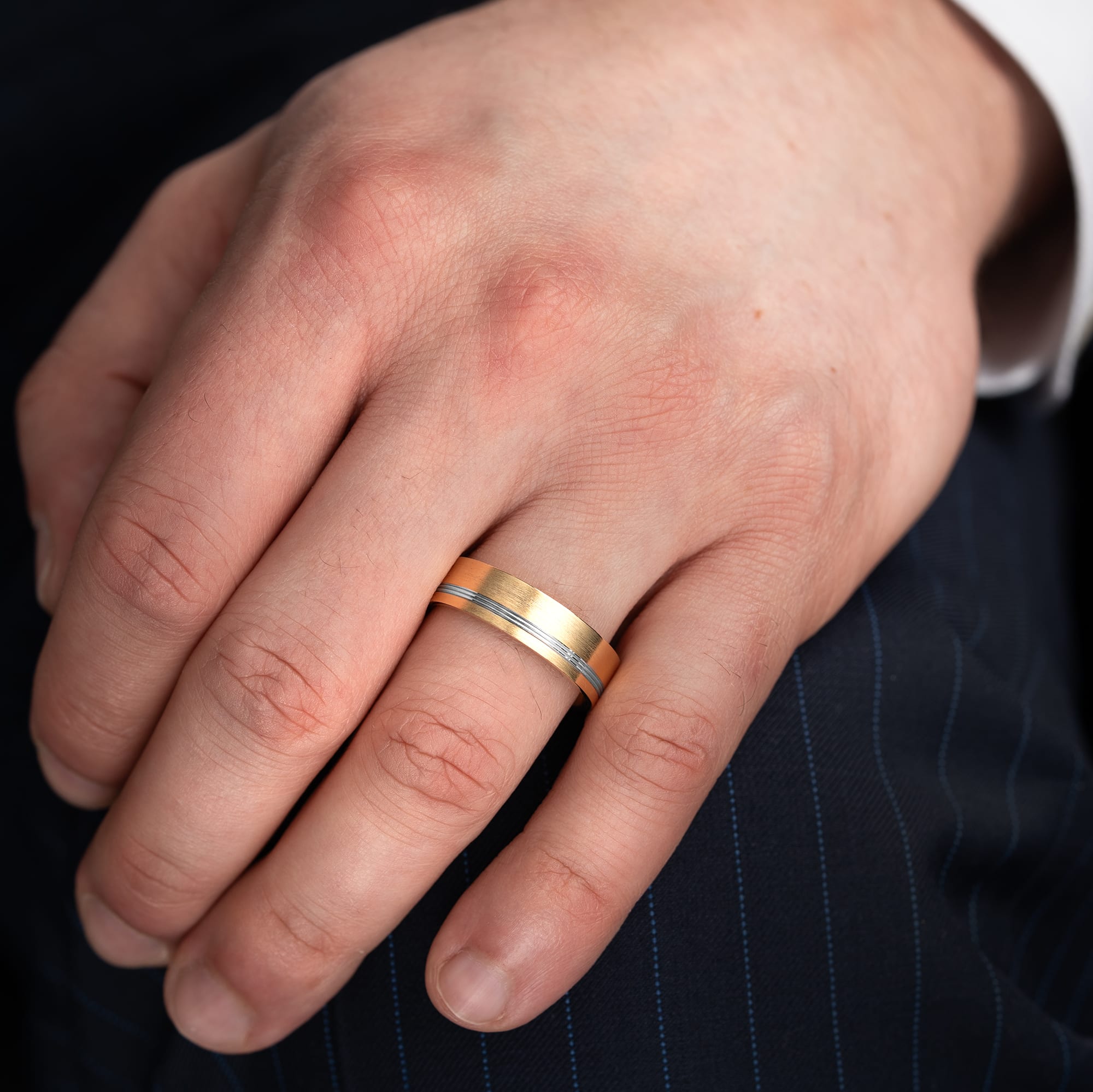 Two tone grooved wedding band 