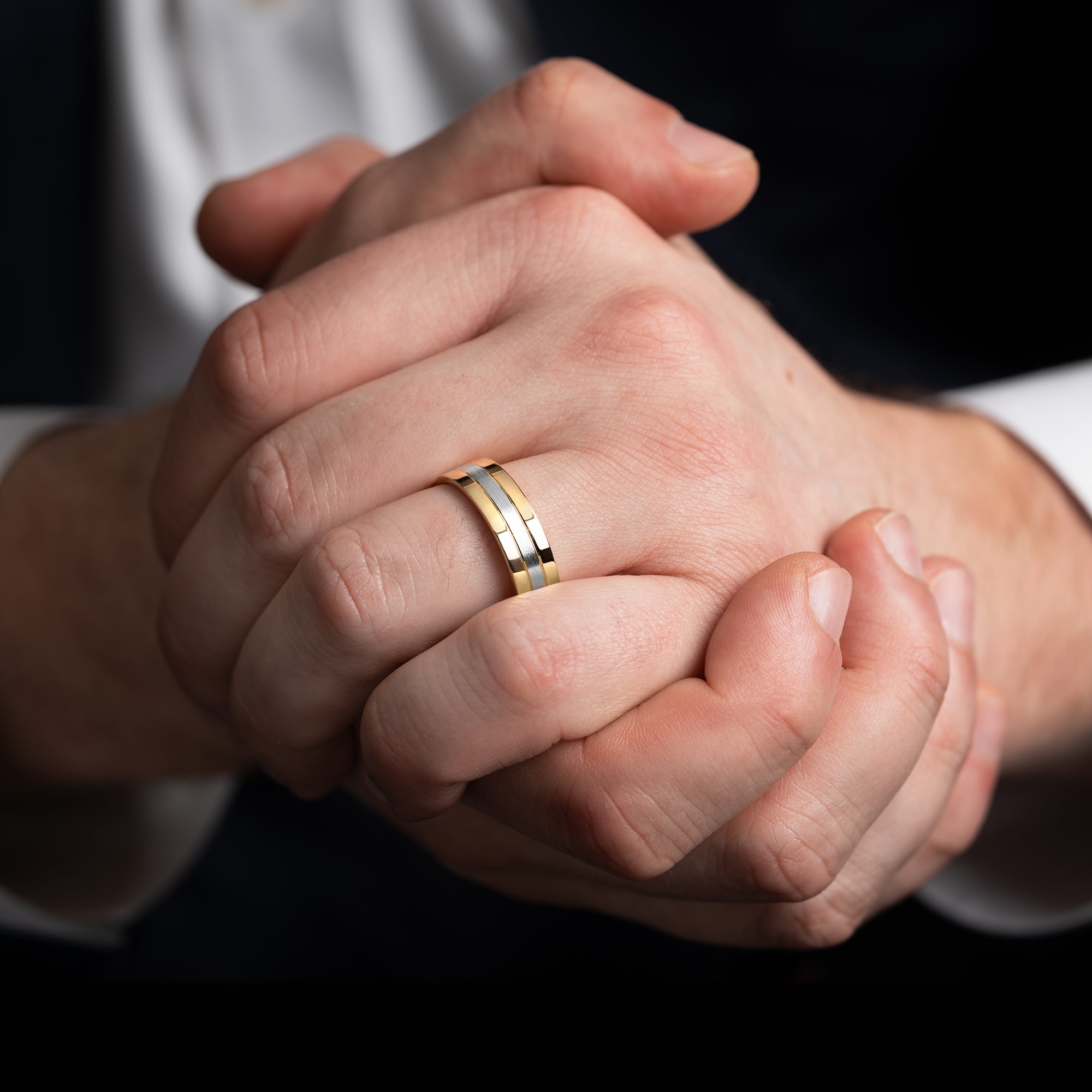 Two tone grooved wedding band 