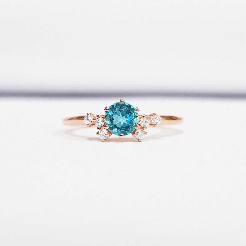 Mint sapphire and diamond unique engagement ring