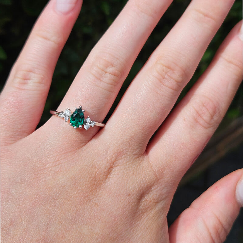 Pear cut lab grown emerald and diamond cluster ring — 4