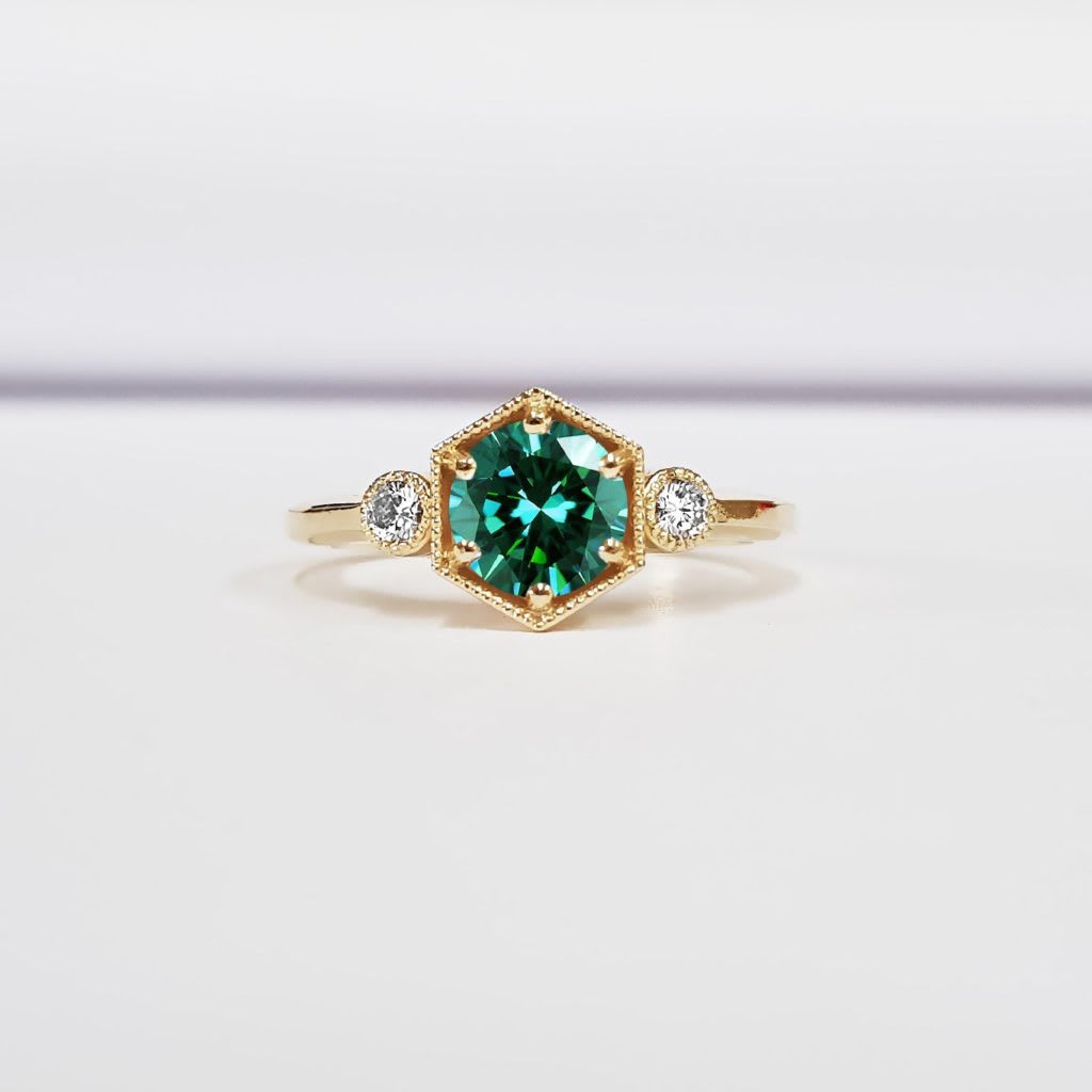 Teal green moissanite trilogy ring — 1