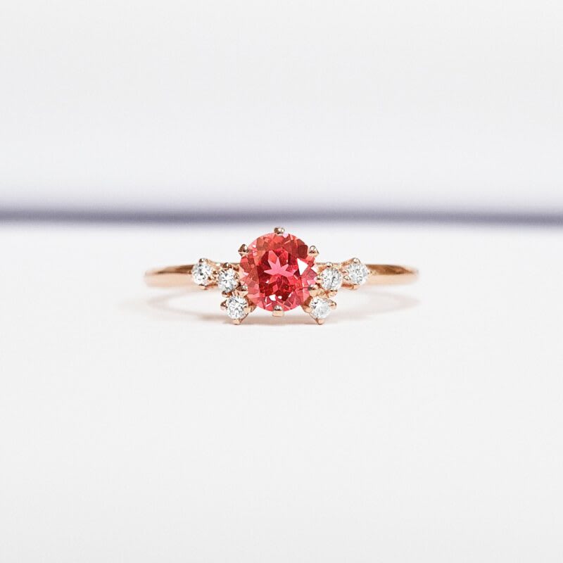 Padparadscha sapphire and diamond ring