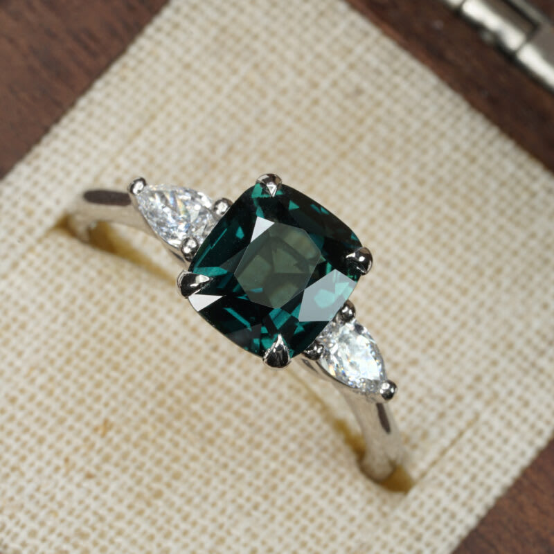 Deep teal cushion sapphire and diamond trilogy ring — 2