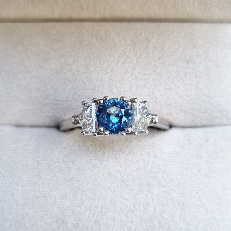 Icy blue sapphire and cadillac cut lab grown diamond trilogy ring