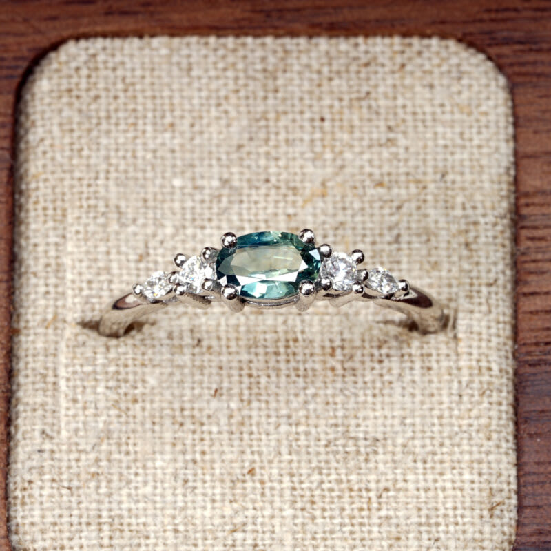 Oval teal sapphire and diamond 5 stone ring — 1