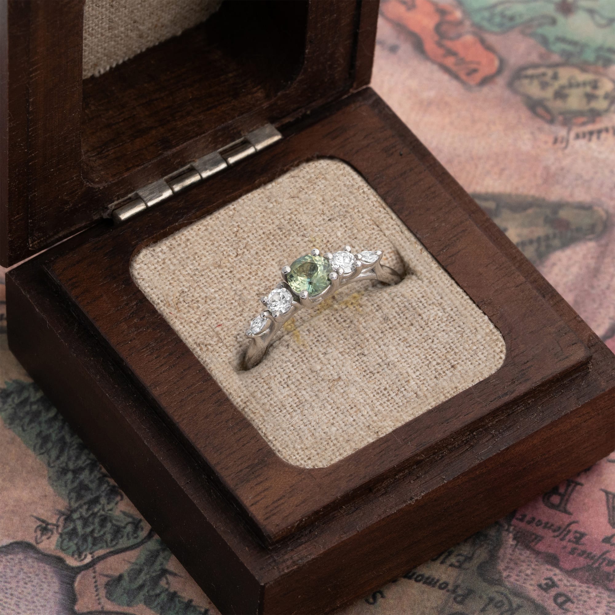'Sonder' Precision cut green sapphire and diamond trellis ring  — 4