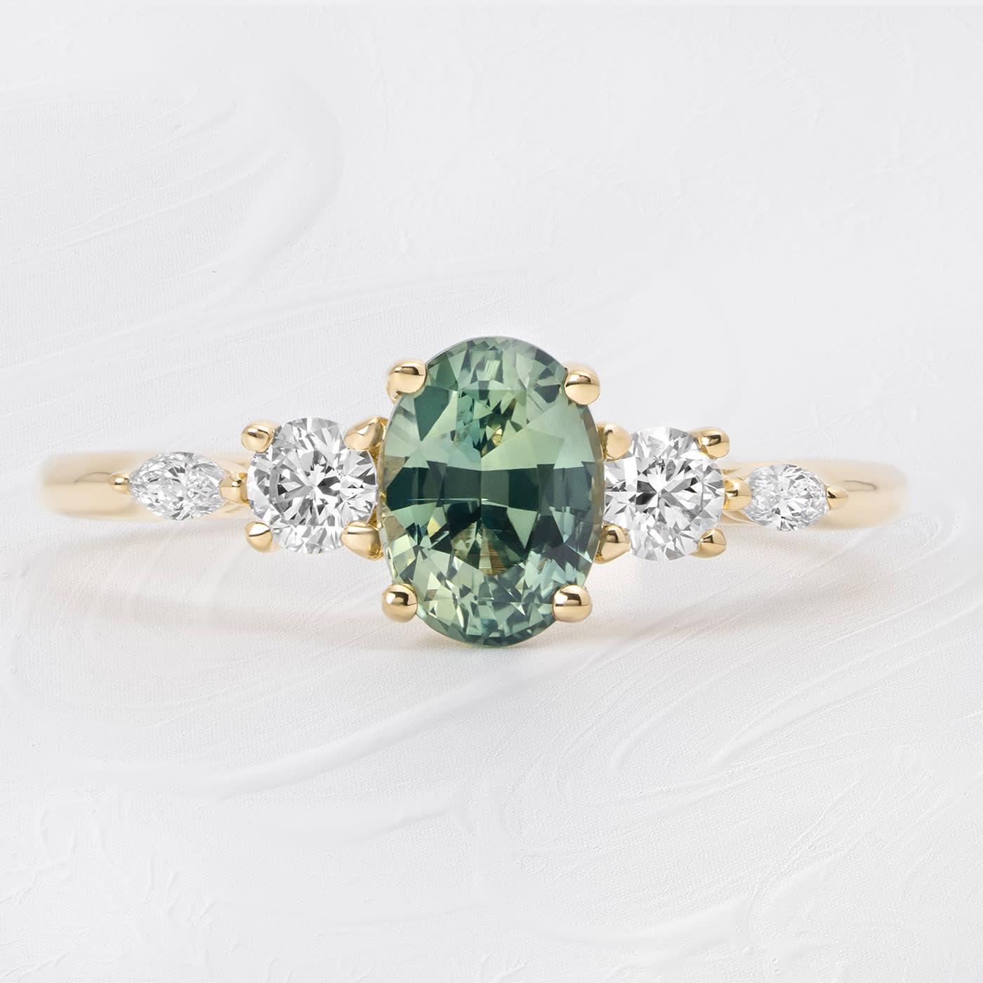 Oval teal sapphire and diamond ring — 1
