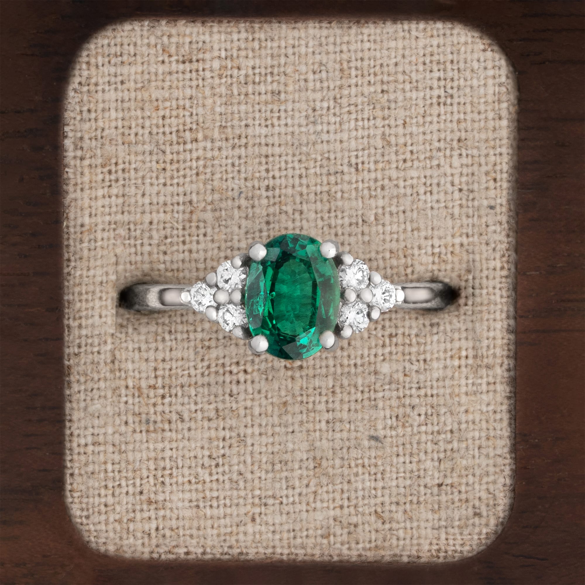 Lab created emerald and diamond ring