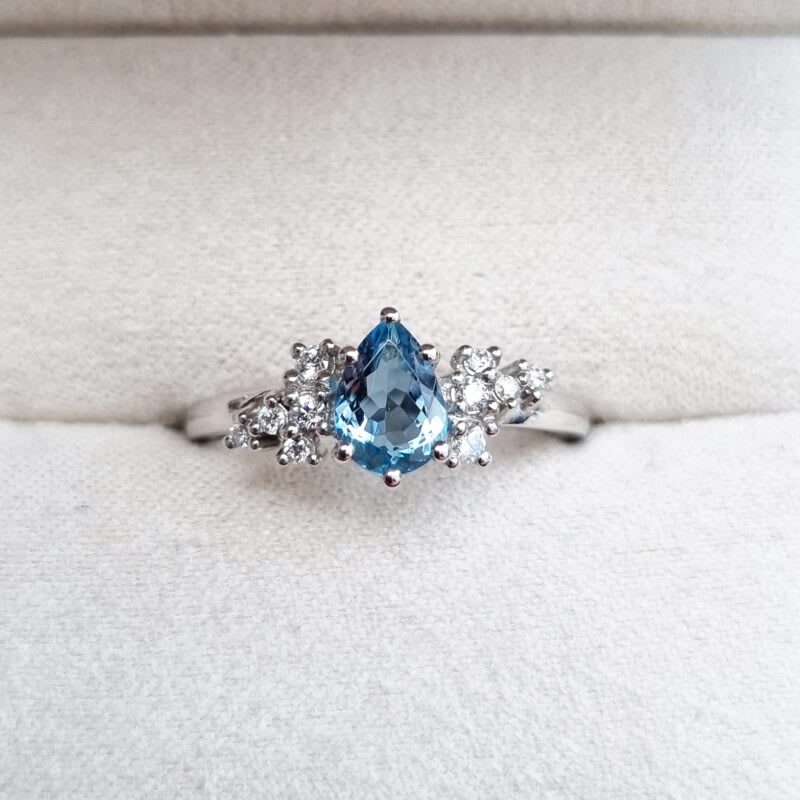 Pear cut aquamarine and diamond cluster ring