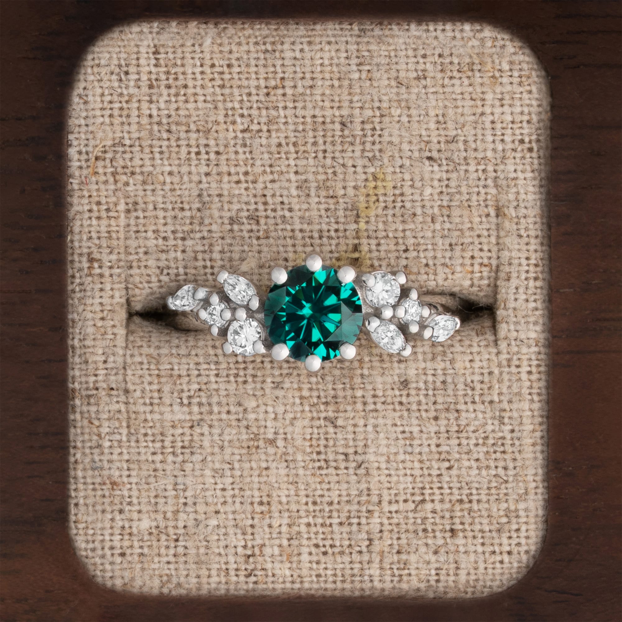 Round teal green moissanite and diamond cluster ring