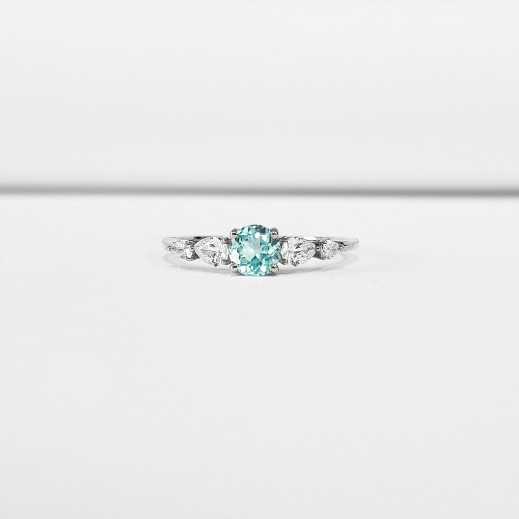 Mint sapphire and diamond engagement ring