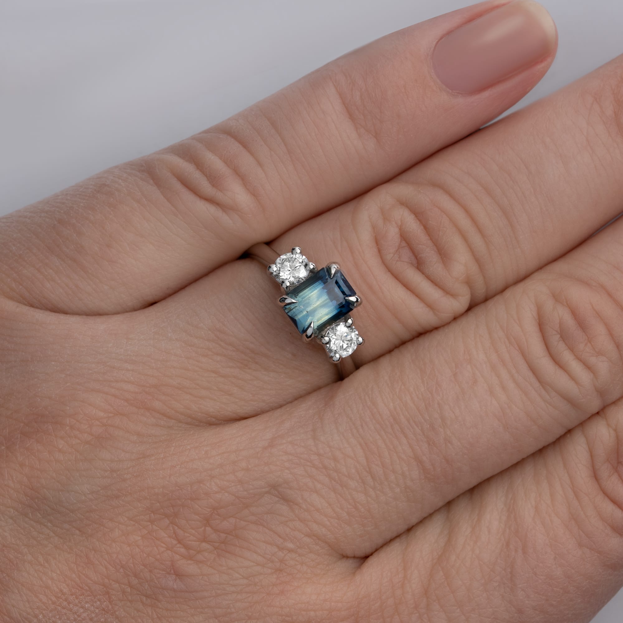 Bi colour emerald cut sapphire and diamond ring - alternate view