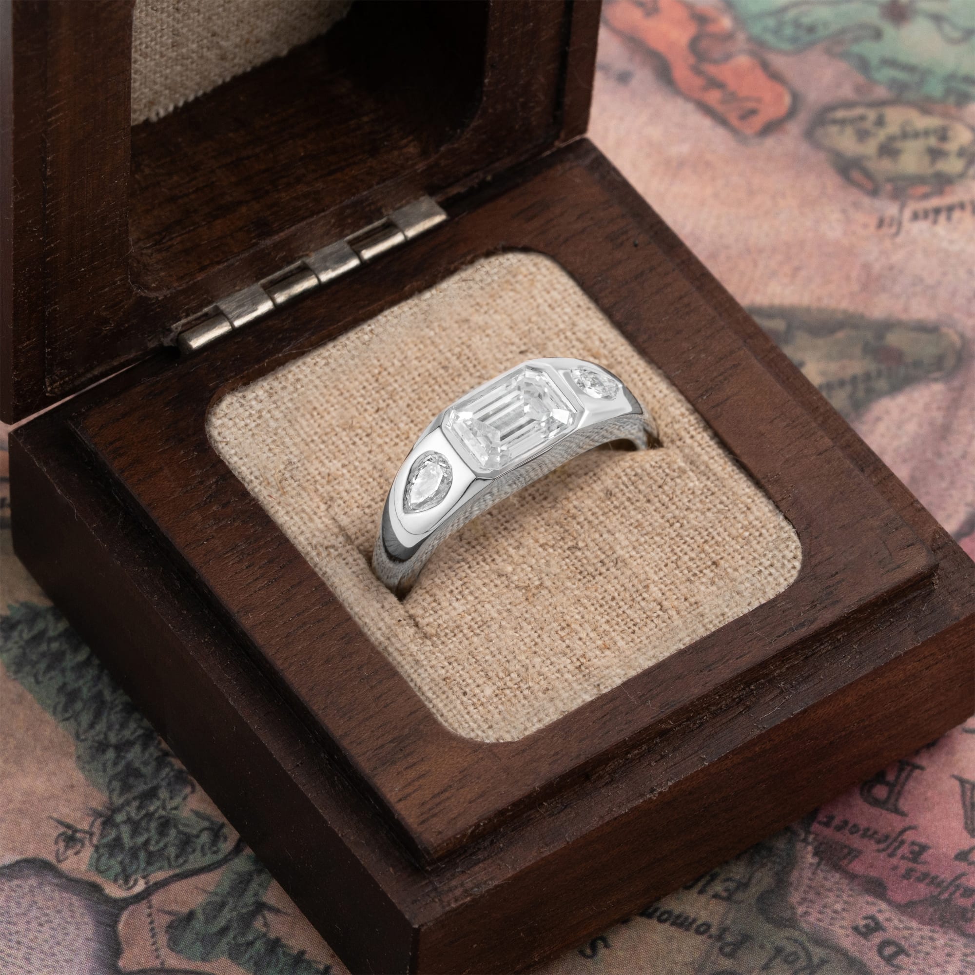 Emerald cut trilogy diamond band  — 3