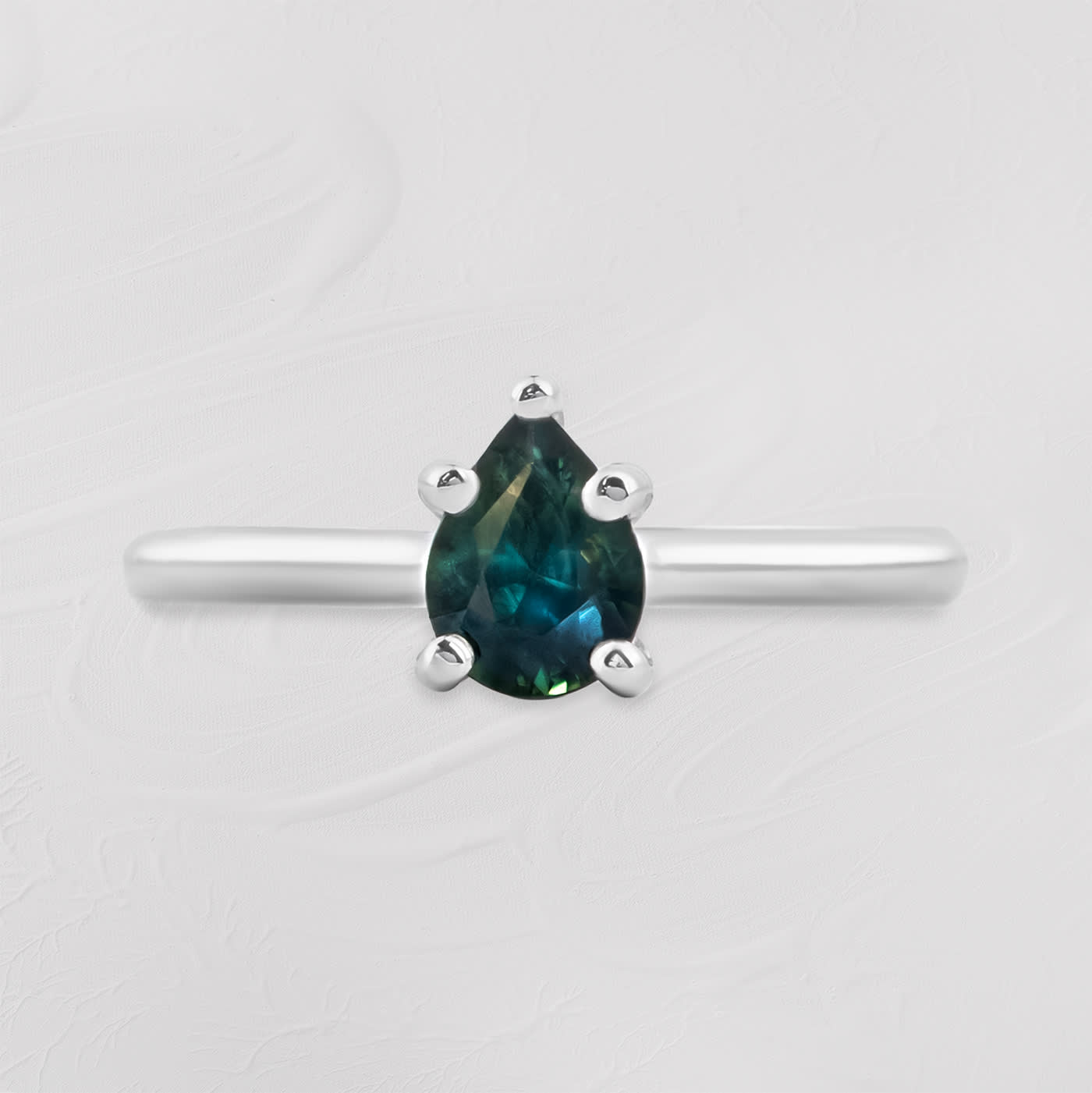 Pear cut teal sapphire solitaire ring — 1