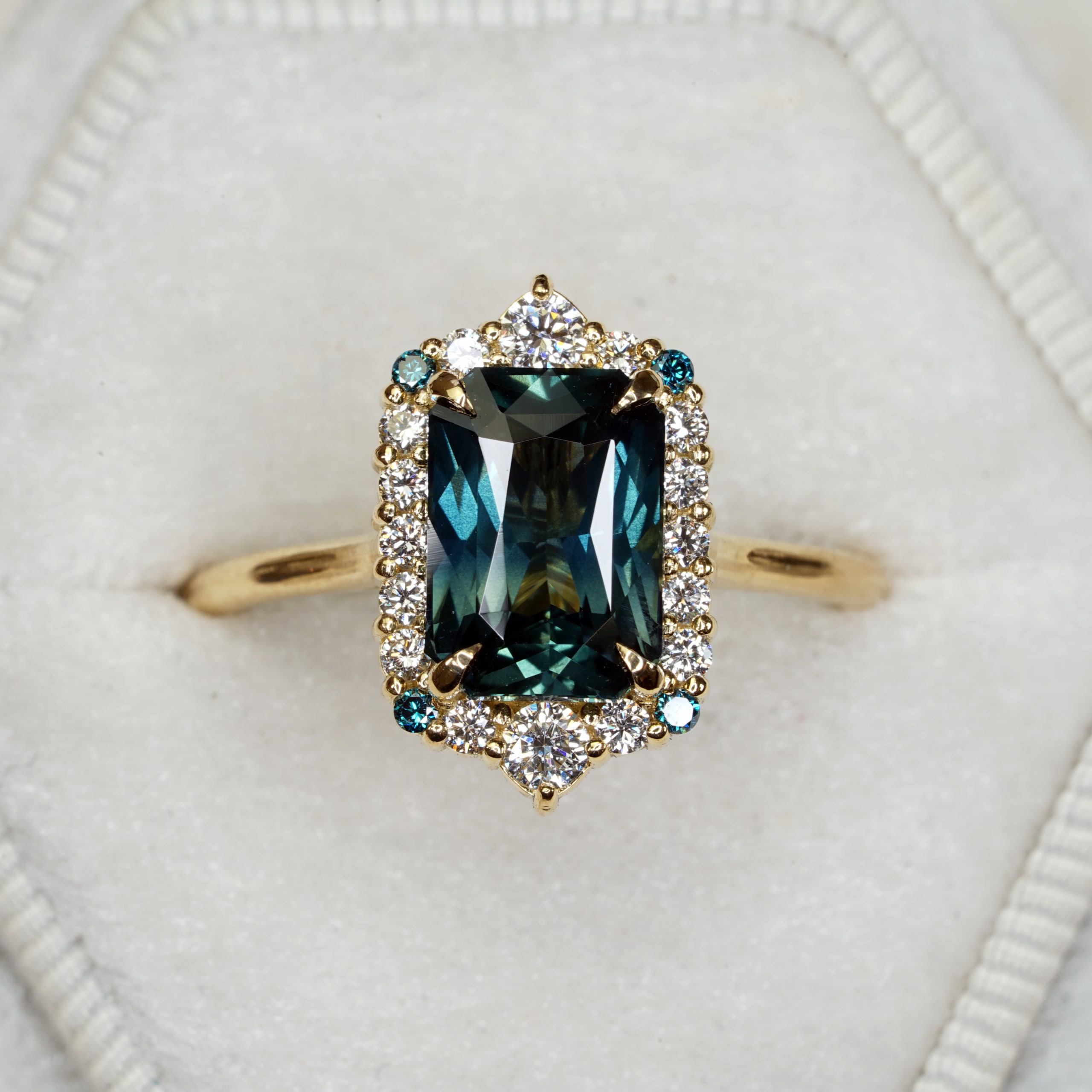 Radiant teal sapphire and diamond halo ring — 1