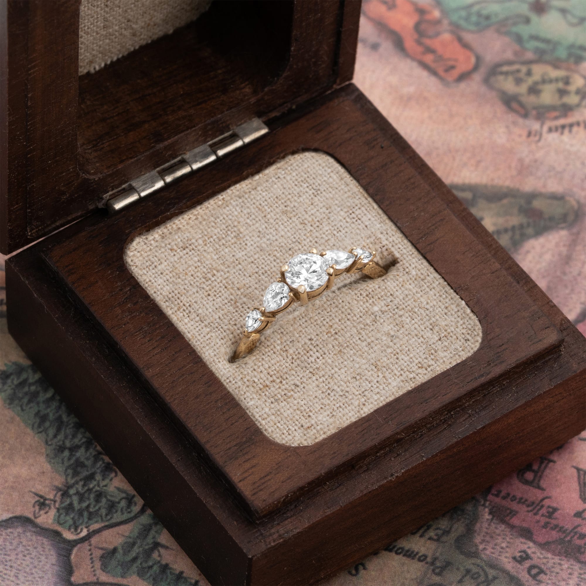 Moissanite and pear diamond engagement ring  — 2