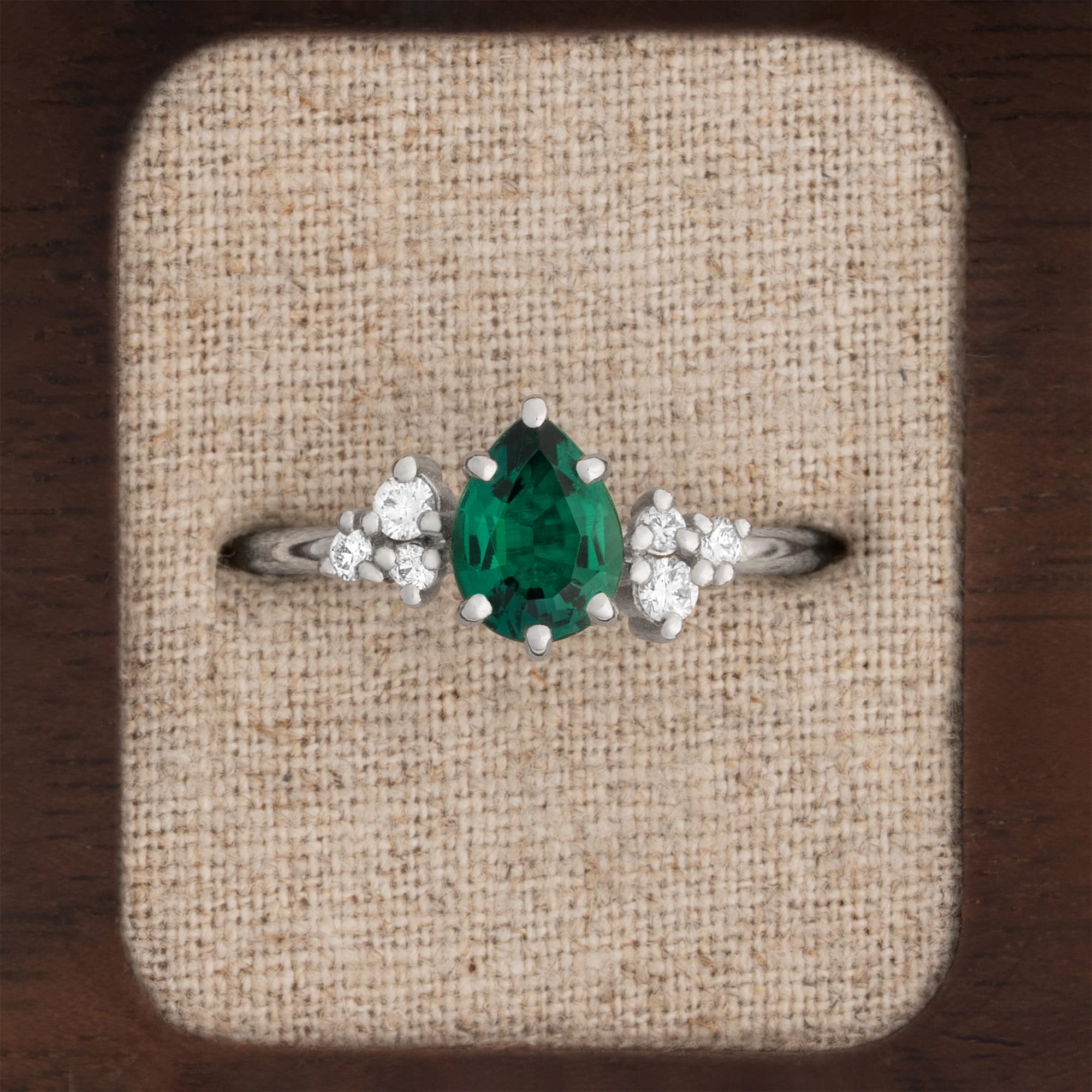 Pear lab grown emerald and diamond cluster ring in 18ct yellow gold