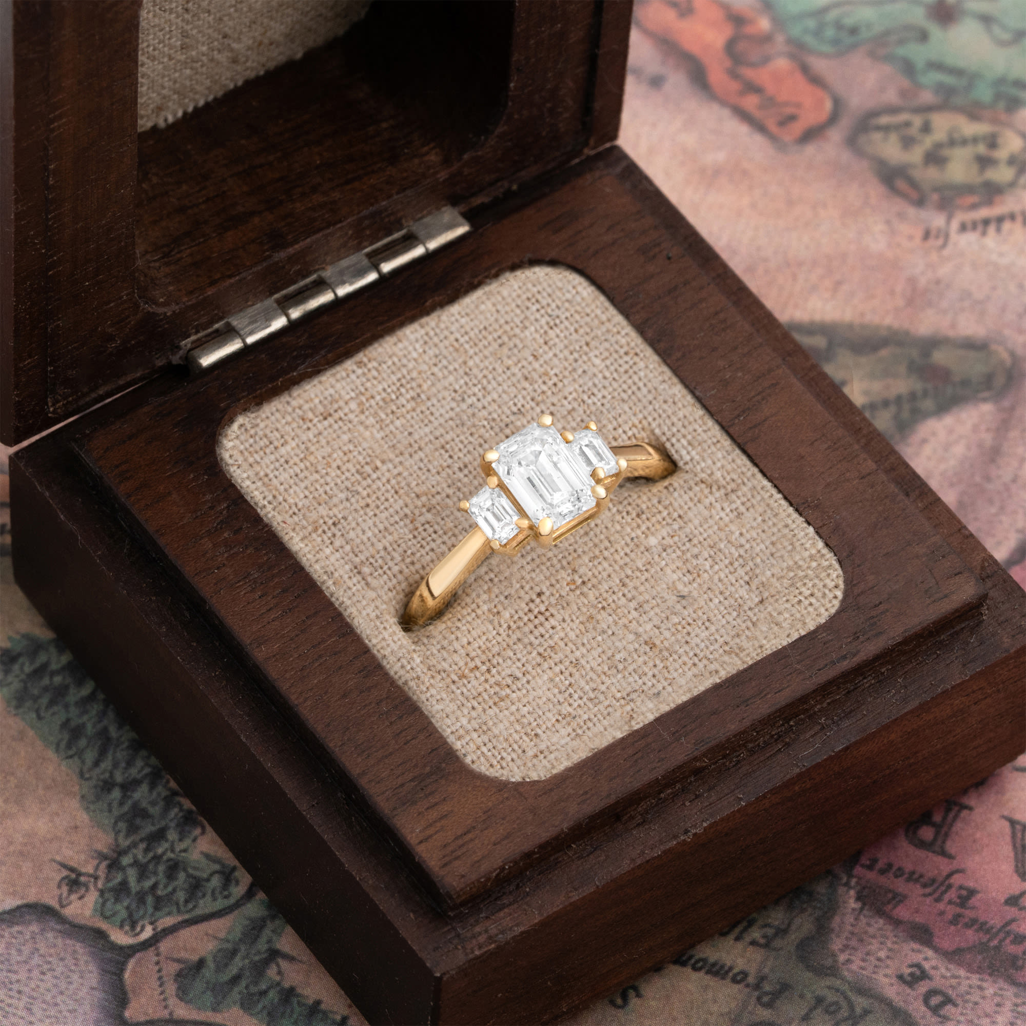 Emerald cut lab grown diamond trilogy ring — 3
