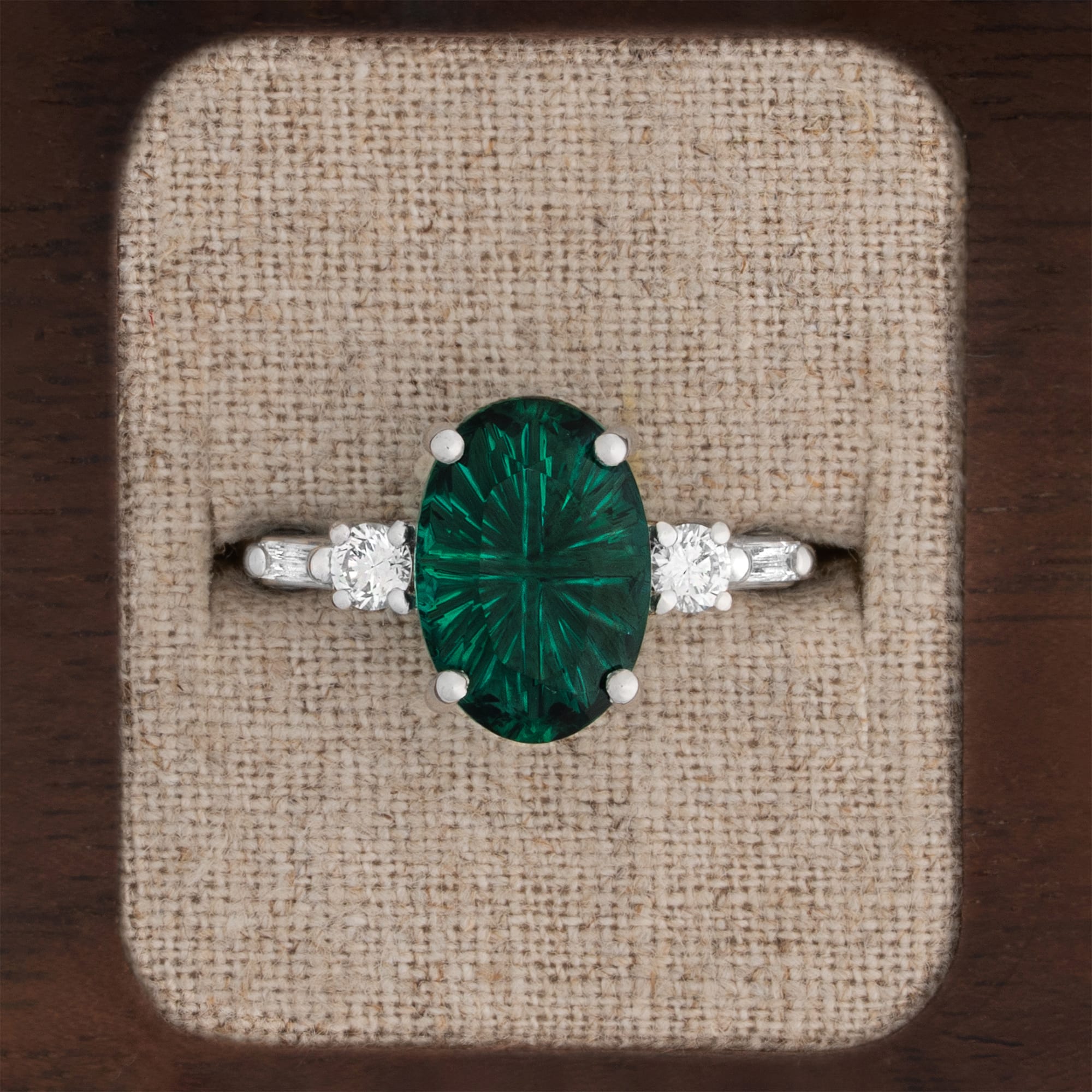 Fantasy cut emerald and diamond ring