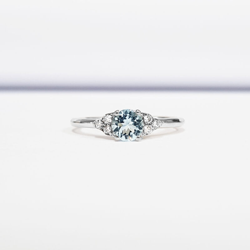 Aquamarine and diamond engagement ring