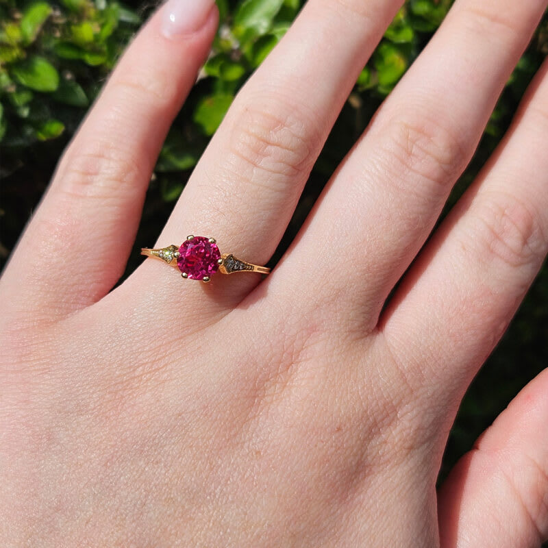 Padparadscha sapphire and diamond engagement ring — 2