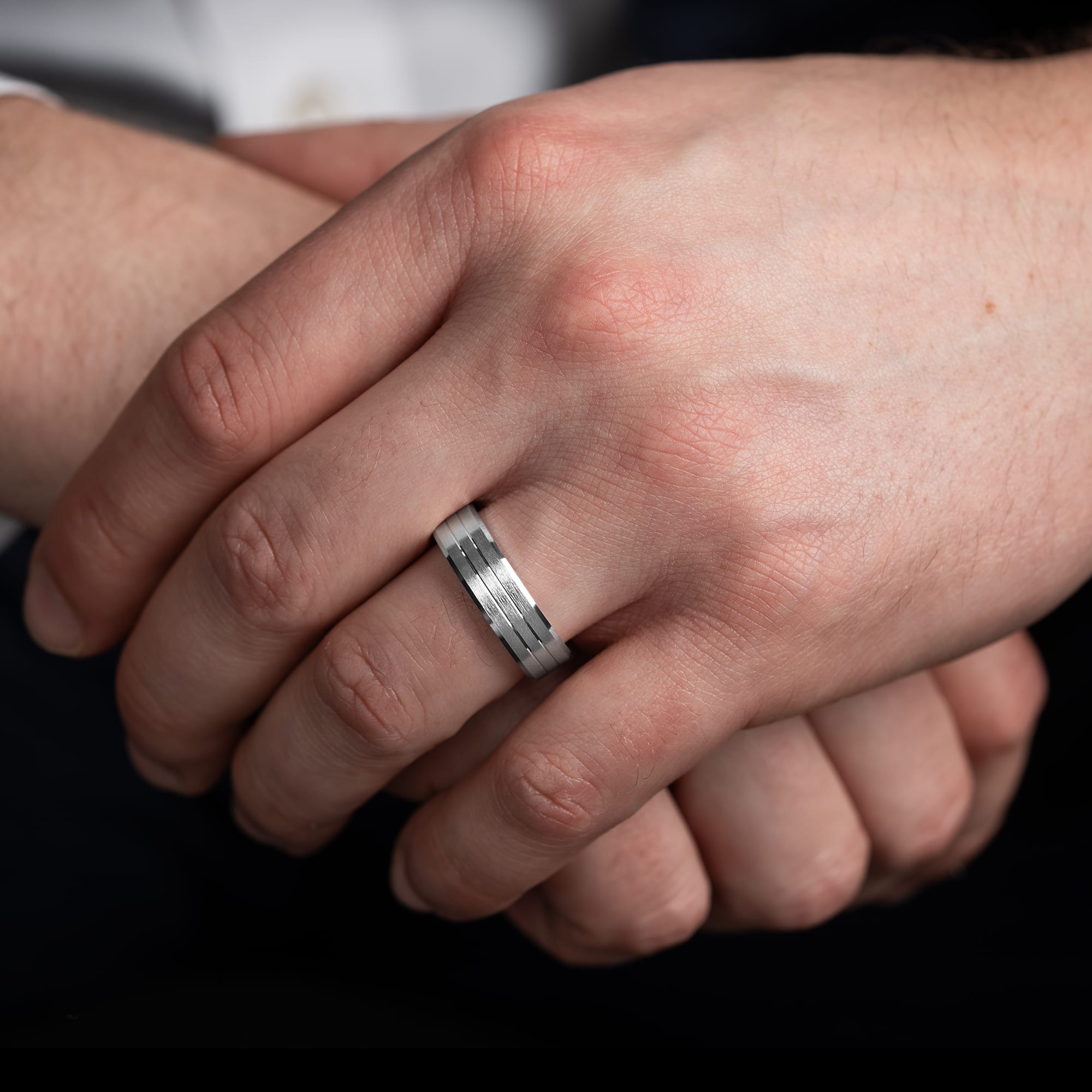 Beveled edge tramline wedding band 