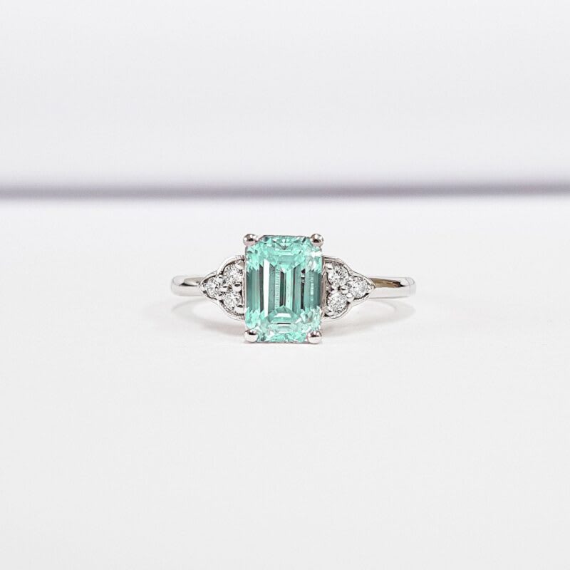 Emerald cut mint sapphire and diamond ring 