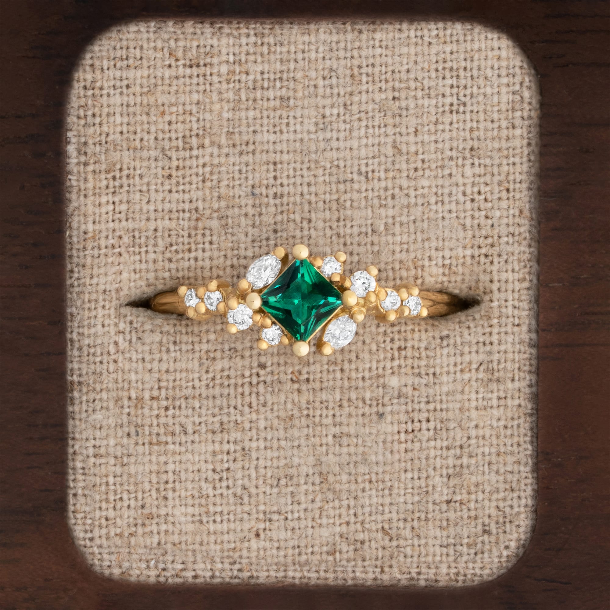 Princess cut lab emerald and diamond cluster ring